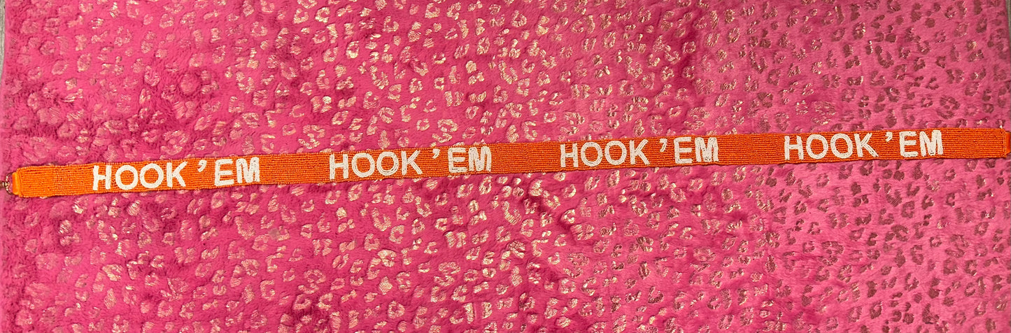 Hook em Strap