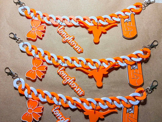 Longhorn cross body strap