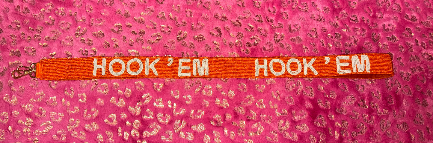 Hook em Strap